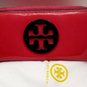 Tory Burch patent leather wallet in Loganberry color.
